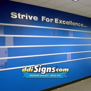 https://www.ddisigns.com/wp-content/uploads/2016/04/Sign-Track-Office-Photo-Display-with-Routed-Letters-DDI-Signs-300x300.jpg